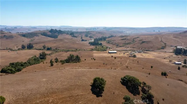 a view of a backyard of a house