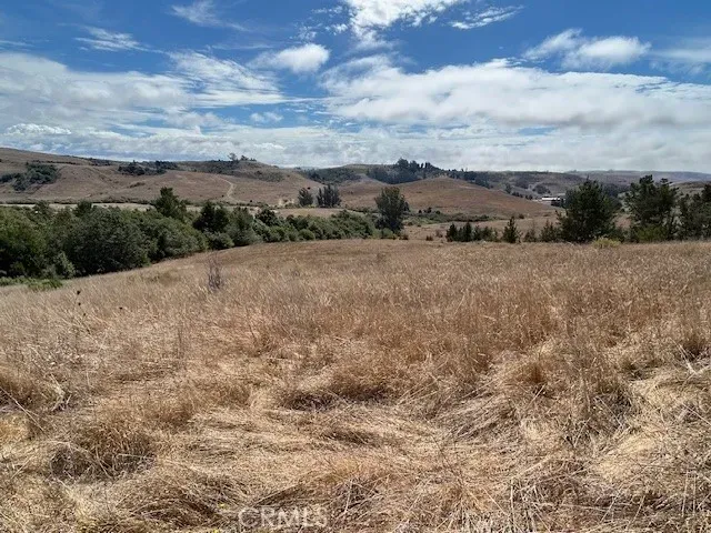 a view of a lake with mountains in the background