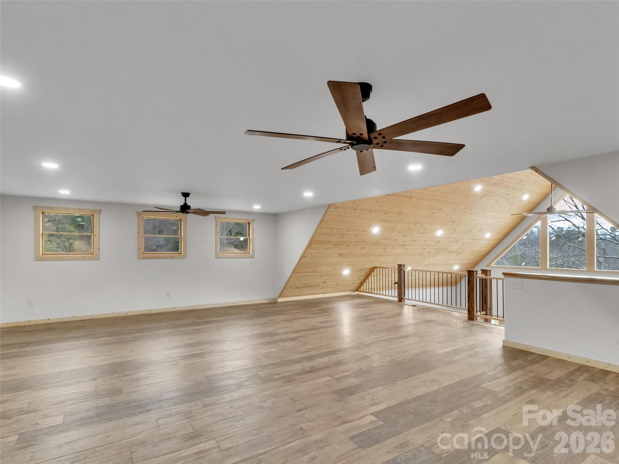 171 Cowtail Cove Clyde, NC 28721 - Photo 27 of 48 a view of a room with a ceiling fan