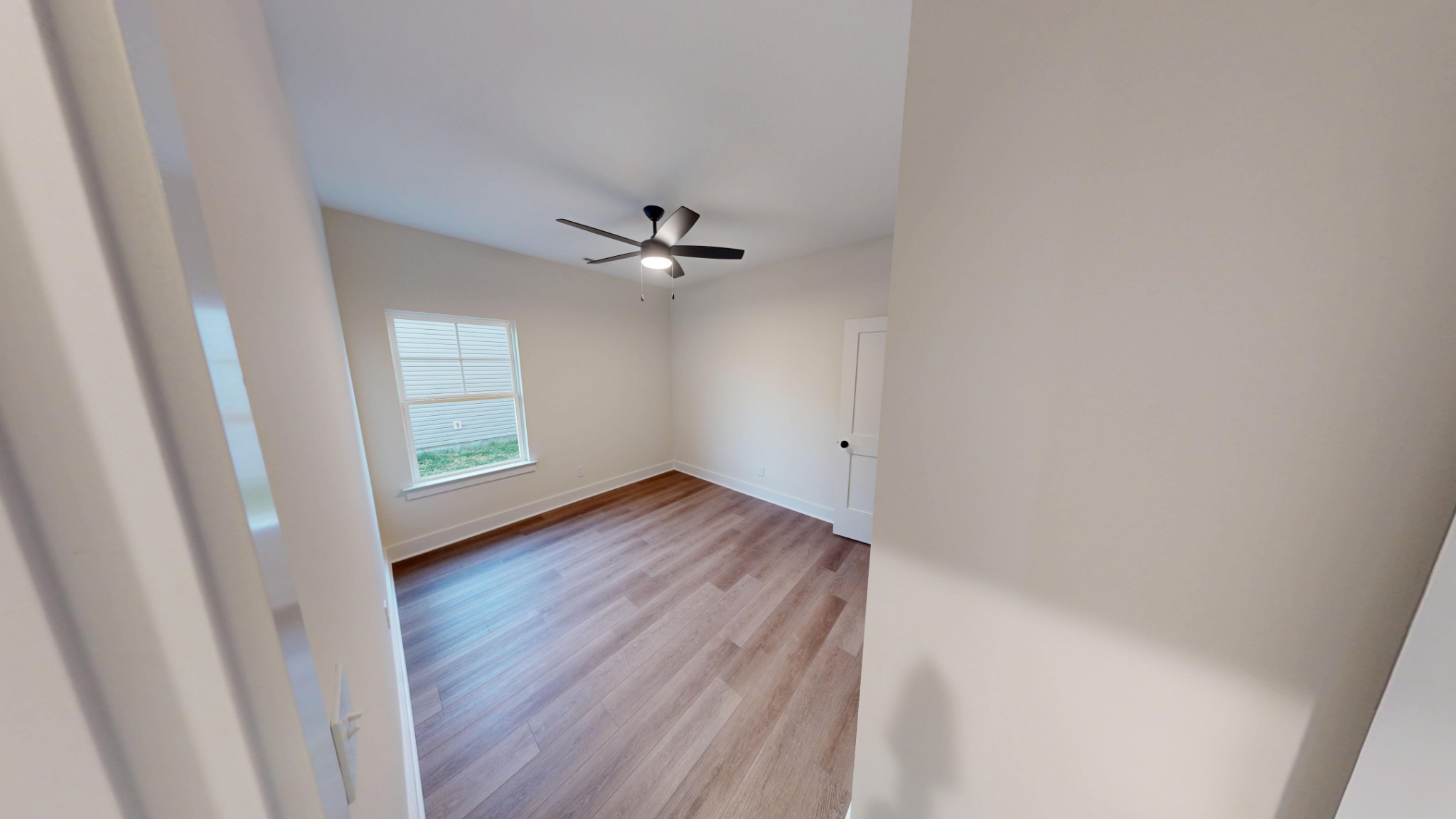1105 Shallow Water Way Murfreesboro, TN 37127 - Photo 17 of 25 wooden floor in an empty room with a window
