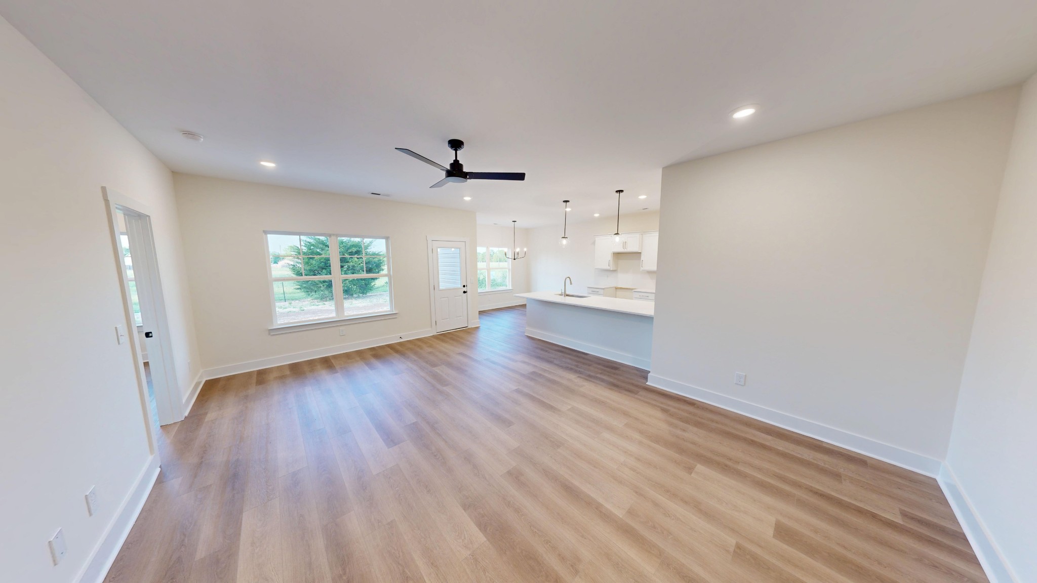 1105 Shallow Water Way Murfreesboro, TN 37127 - Photo 2 of 25 a view of an empty room with a window and wooden floor