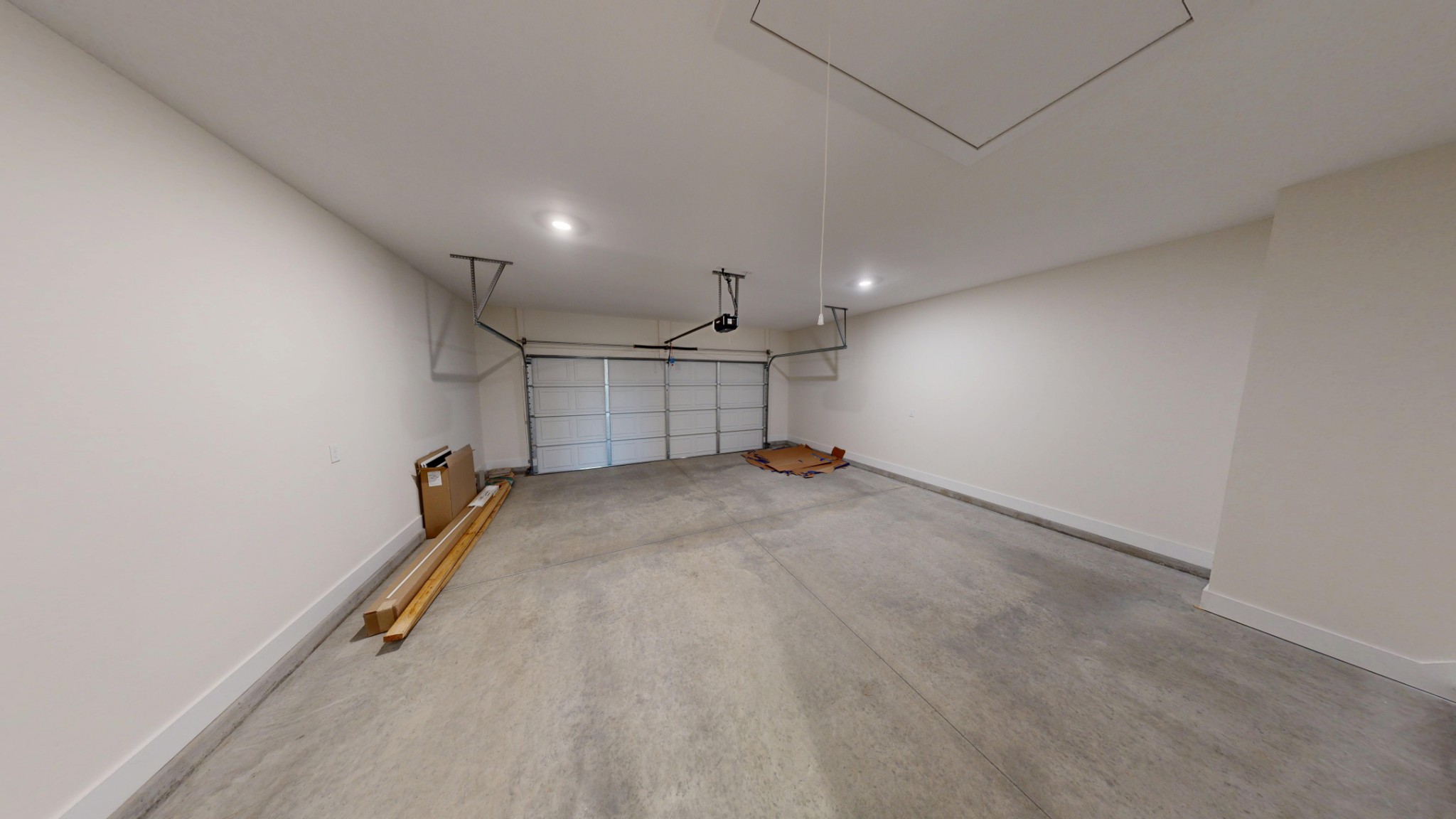 1105 Shallow Water Way Murfreesboro, TN 37127 - Photo 23 of 25 an empty room with a projector and wooden floor