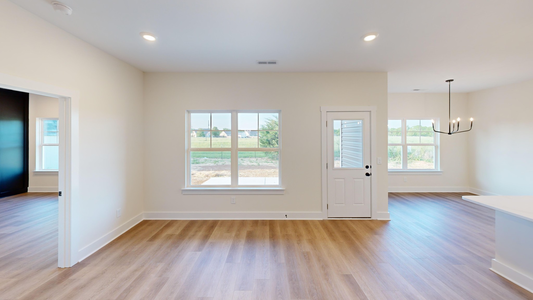 1105 Shallow Water Way Murfreesboro, TN 37127 - Photo 4 of 25 an empty room with wooden floor and windows