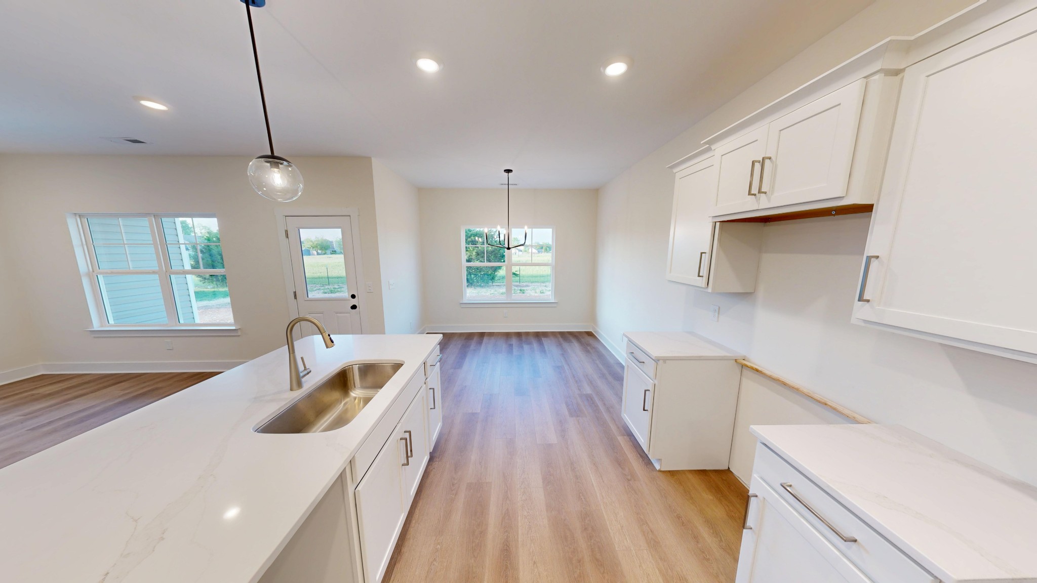 1105 Shallow Water Way Murfreesboro, TN 37127 - Photo 7 of 25 a kitchen with counter top space a sink appliances and cabinets