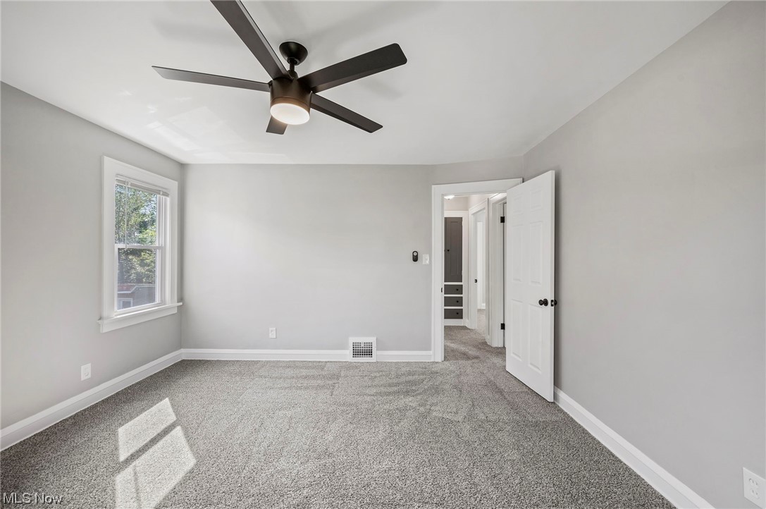 1022 Englewood Road Cleveland, OH 44121 - Photo 29 of 33 Empty room featuring light colored carpet and ceiling fan