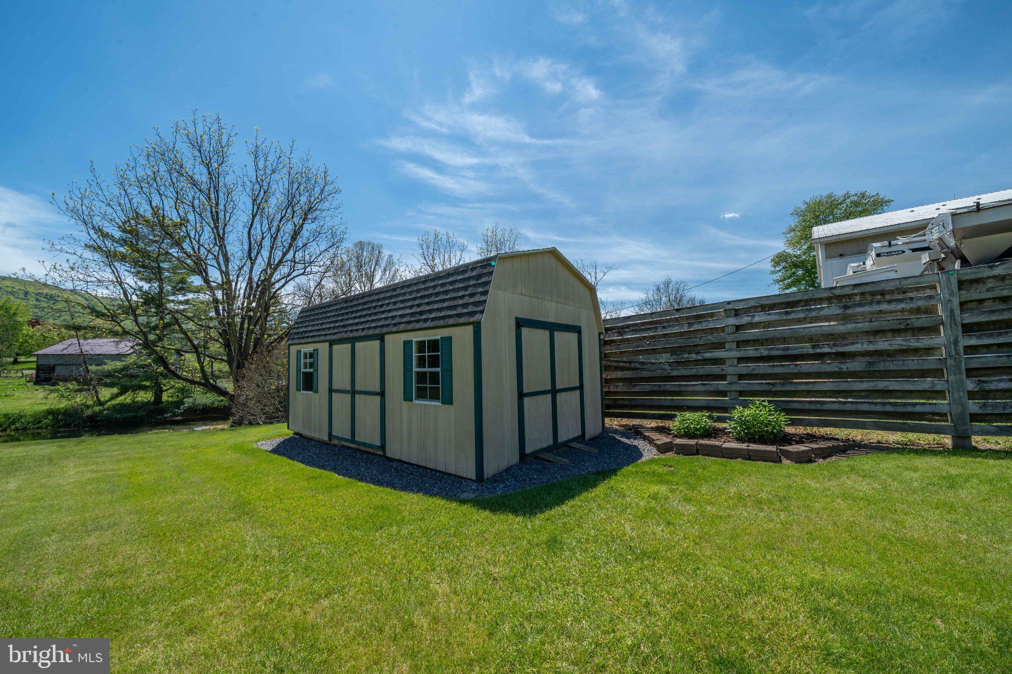 340 Applehouse Road Belleville, PA 17004 - Photo 23 of 76 Charming garden shed in serene setting.