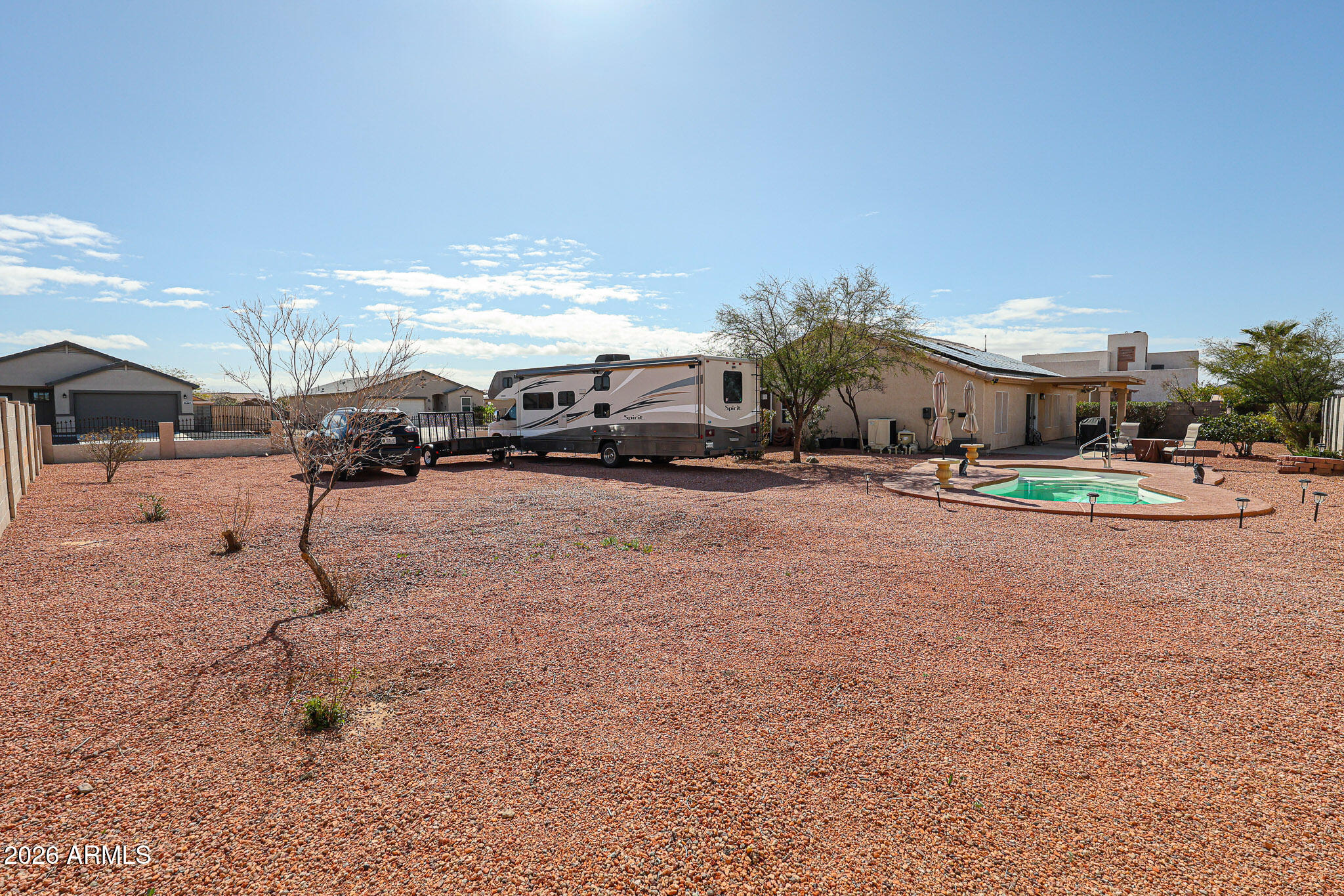 14980 South Capistrano Road Arizona City, AZ 85123 - Photo 26 of 39 a outdoor space with lots of white furniture