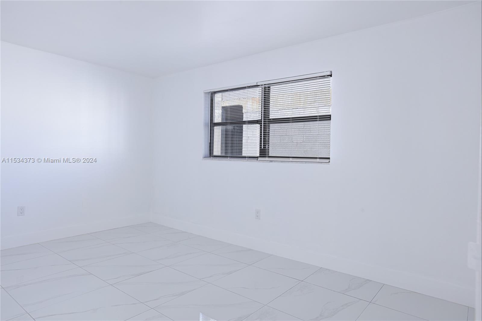 Flamingo-Lummus Miami Beach, FL 33139 - Photo 11 of 16 an empty room with a window