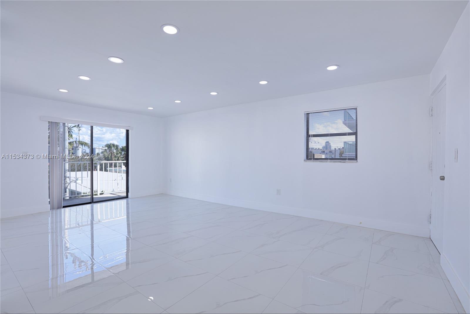 Flamingo-Lummus Miami Beach, FL 33139 - Photo 4 of 16 an empty room with windows and closet