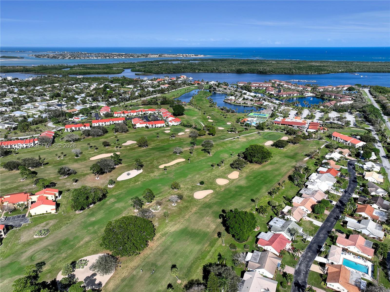5463 Southeast Miles Grant Road, Unit 210 Stuart, FL 34997 - Photo 2 of 53 a view of city and ocean