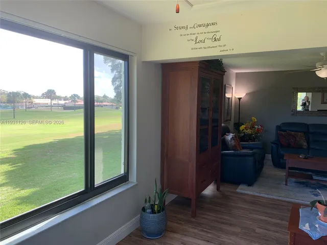 a view of a living room and dining room
