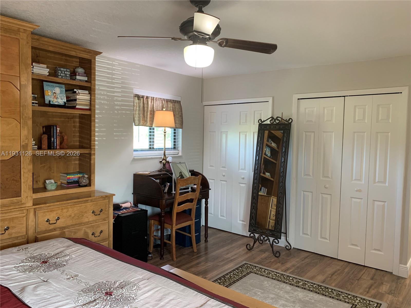 5463 Southeast Miles Grant Road, Unit 210 Stuart, FL 34997 - Photo 42 of 53 a view of a workspace with furniture and a window