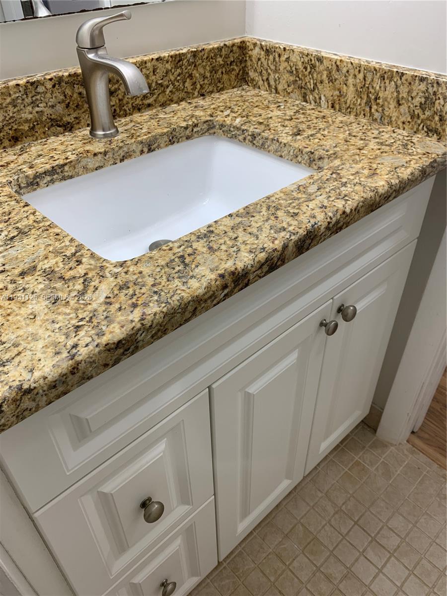 5463 Southeast Miles Grant Road, Unit 210 Stuart, FL 34997 - Photo 44 of 53 a view of kitchen sink