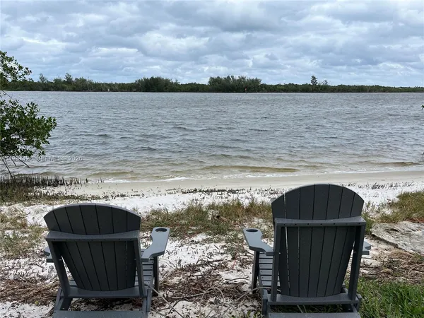 a play ground with swimming pool in front of it