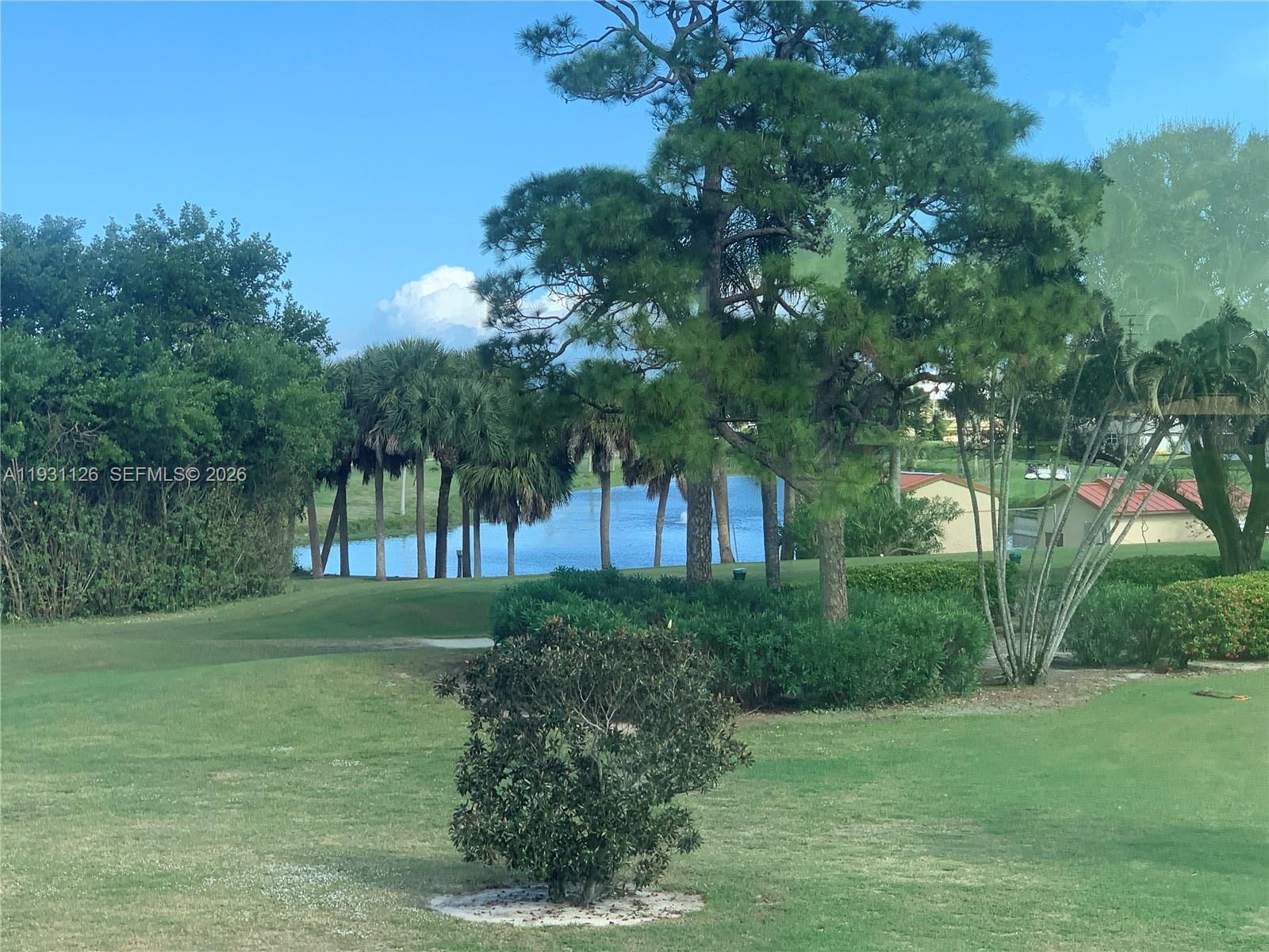 5463 Southeast Miles Grant Road, Unit 210 Stuart, FL 34997 - Photo 6 of 53 a view of a garden