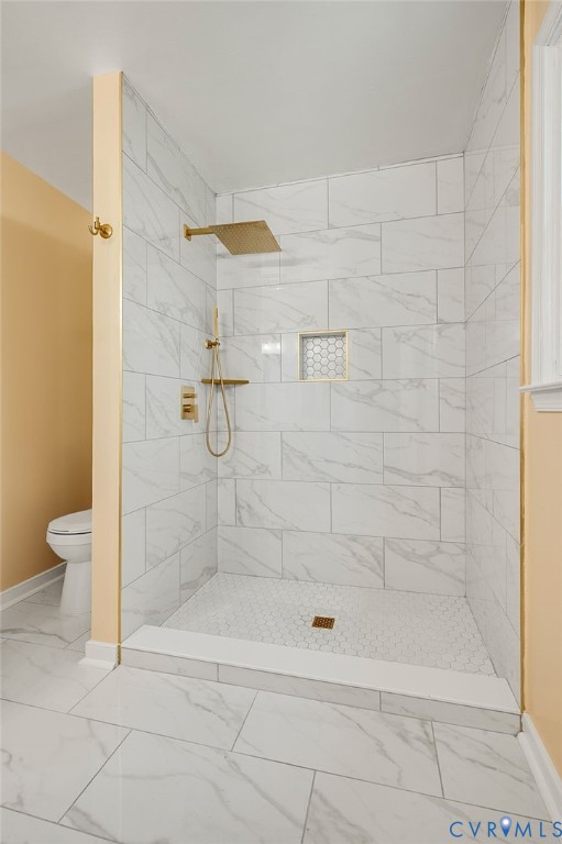 10110 Holly Road Mechanicsville, VA 23116 - Photo 24 of 26 Walk-in shower featuring a rain showerhead, handhe