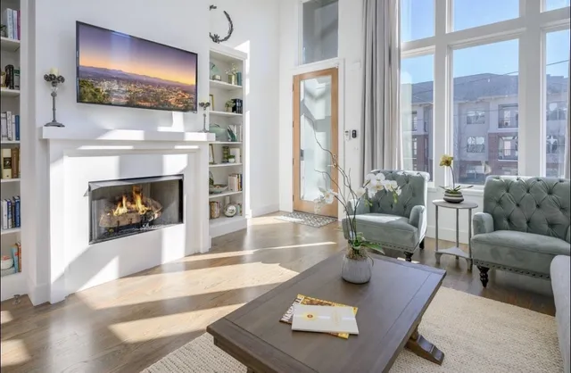 a kitchen with a sink cabinets and wooden floor