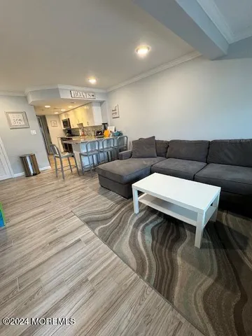 a living room with furniture and a table