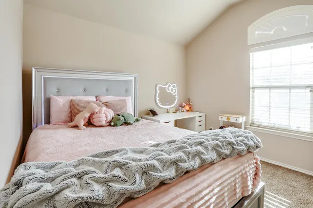 a bathroom with a sink toilet and mirror