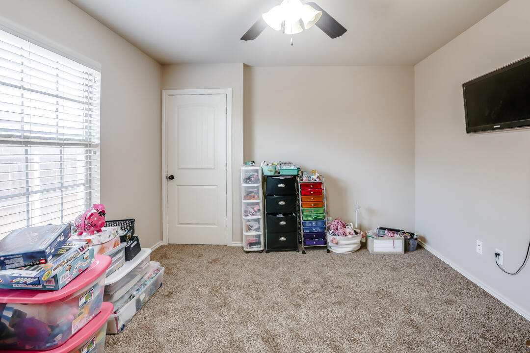 6502 71st Street Lubbock, TX 79424 - Photo 19 of 21 a view of a room with toys