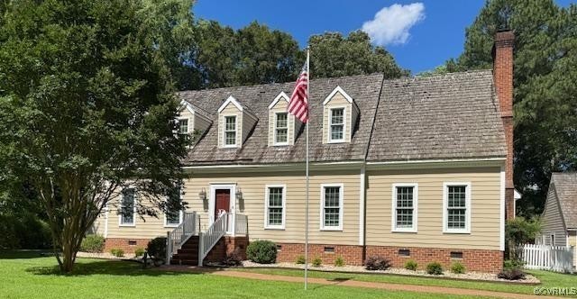 a view of a building with a yard