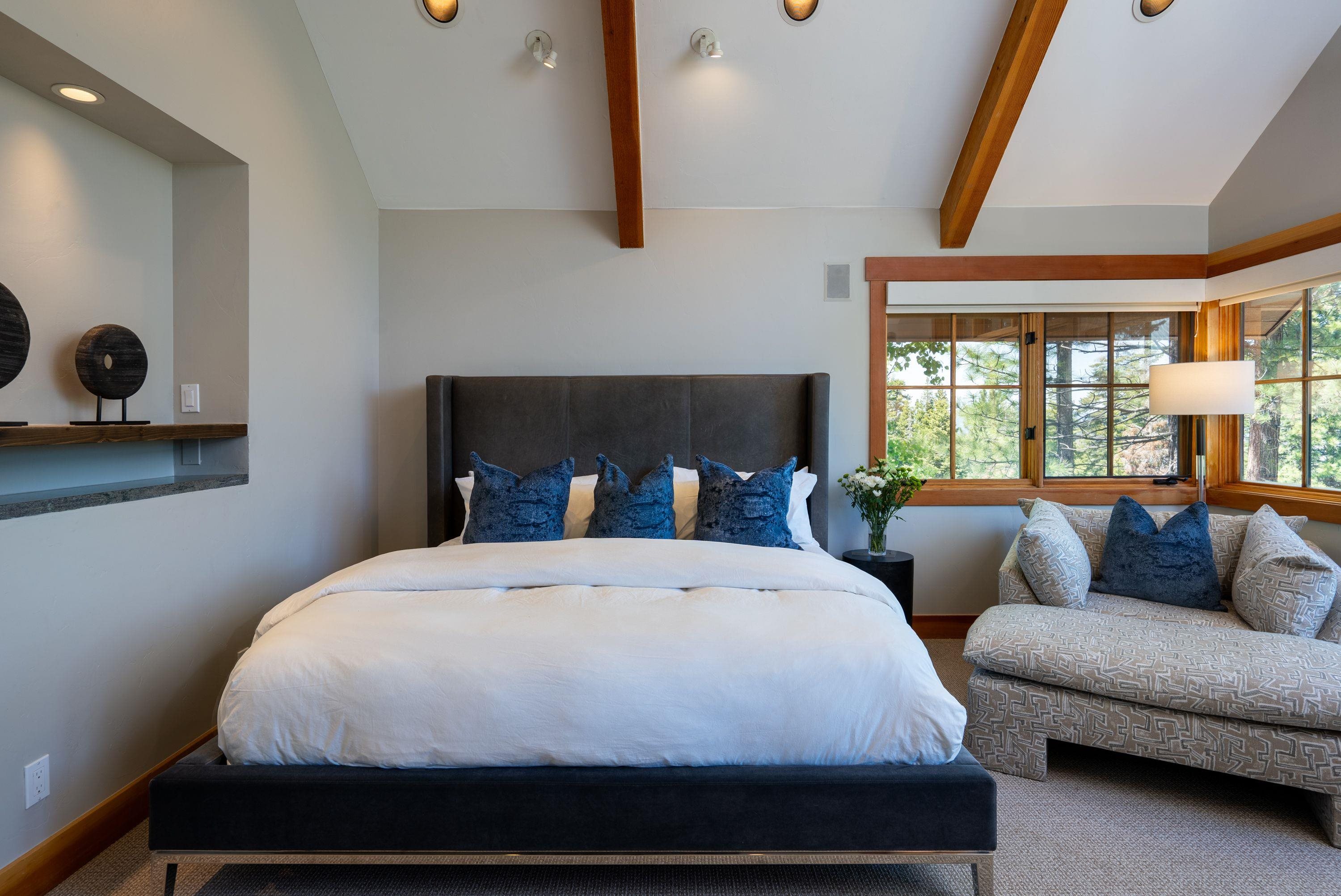 1723 Grouse Ridge Road Truckee, CA 96161 - Photo 11 of 27 a bedroom with a bed two couch and a window