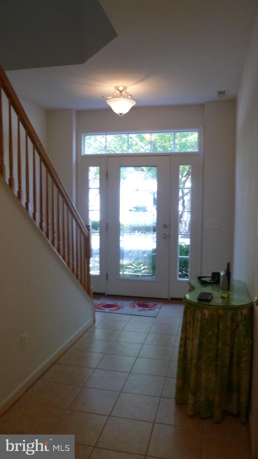 310 Monroe Point Drive Colonial Beach, VA 22443 - Photo 2 of 36 a view of an empty room with a fireplace and a window