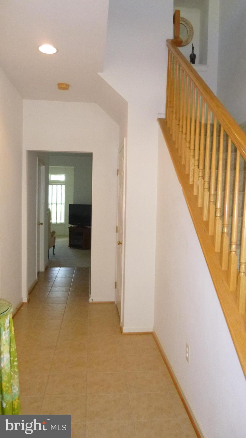 310 Monroe Point Drive Colonial Beach, VA 22443 - Photo 3 of 36 a view of a hallway view with staircase