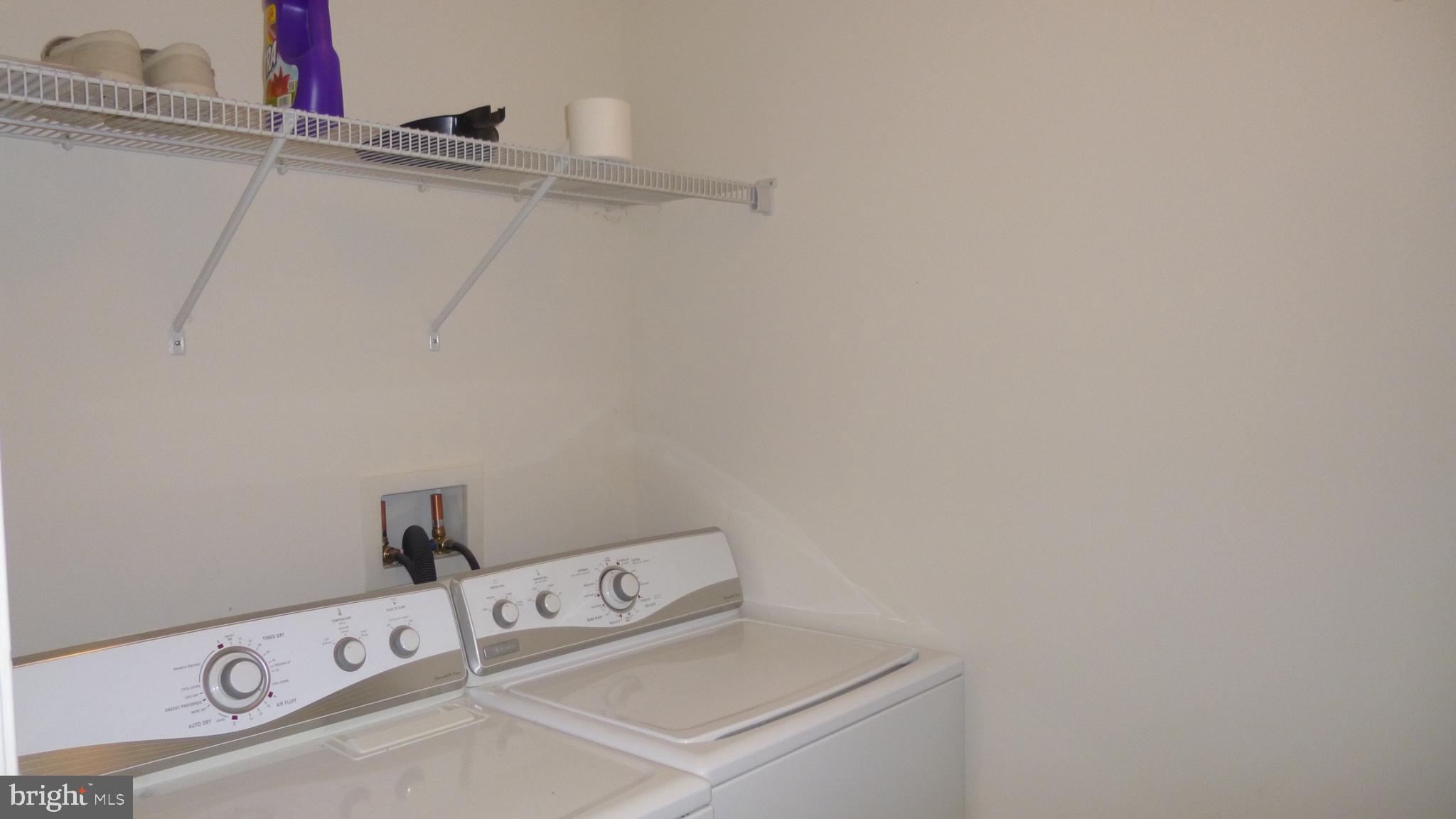 310 Monroe Point Drive Colonial Beach, VA 22443 - Photo 4 of 36 a utility room with dryer and washer