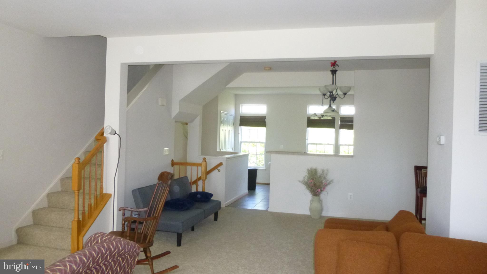 310 Monroe Point Drive Colonial Beach, VA 22443 - Photo 9 of 36 a living room with furniture and wooden floor