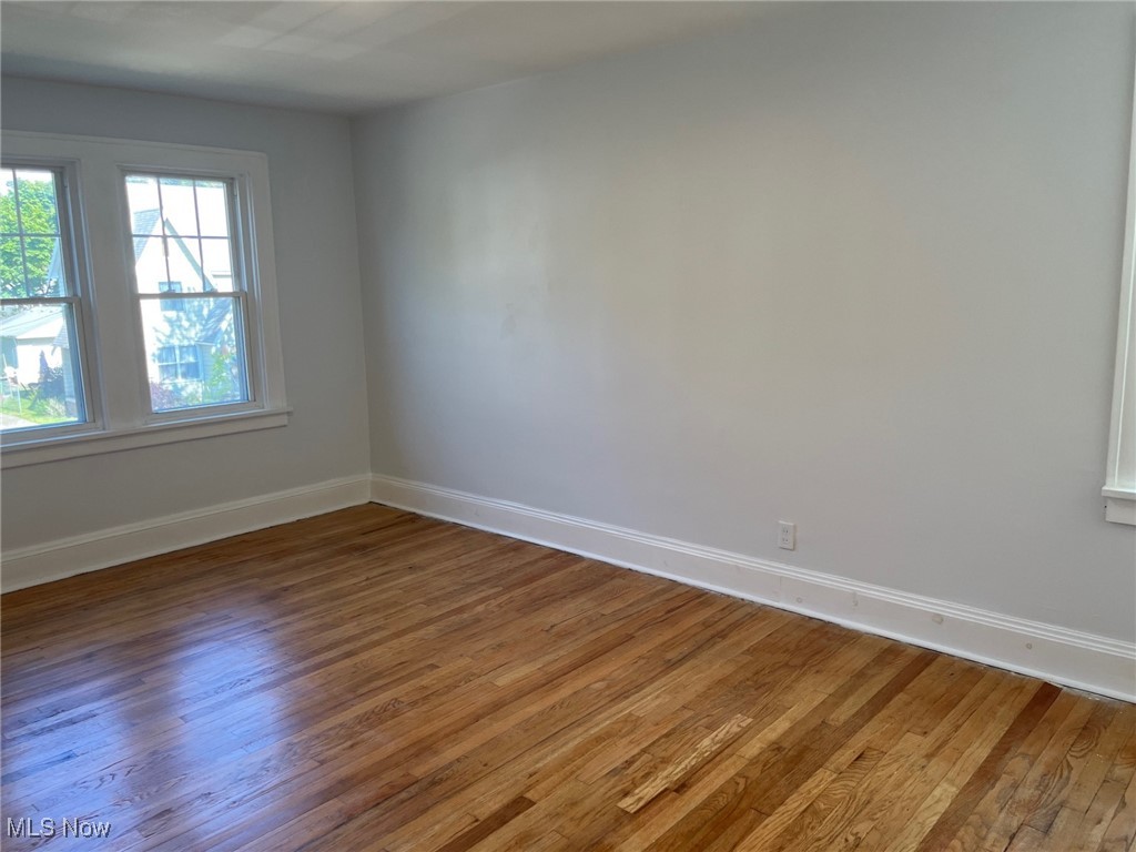 1148 Sylvania Road Cleveland Heights, OH 44121 - Photo 14 of 30 Master bedroom with wood finished floors and baseboards