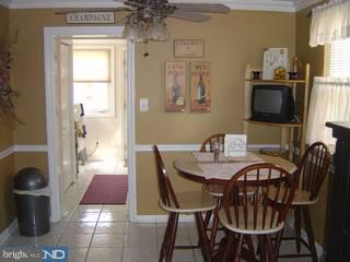 421 Lynbrooke Road Springfield, PA 19064 - Photo 4 of 6 a view of a dining room with furniture and chandelier