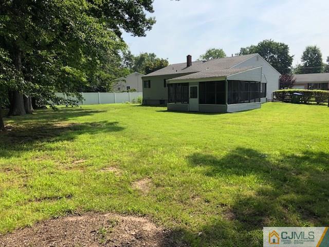 17 Brox Road Edison, NJ 08817 - Photo 11 of 11 a front view of a house with a yard