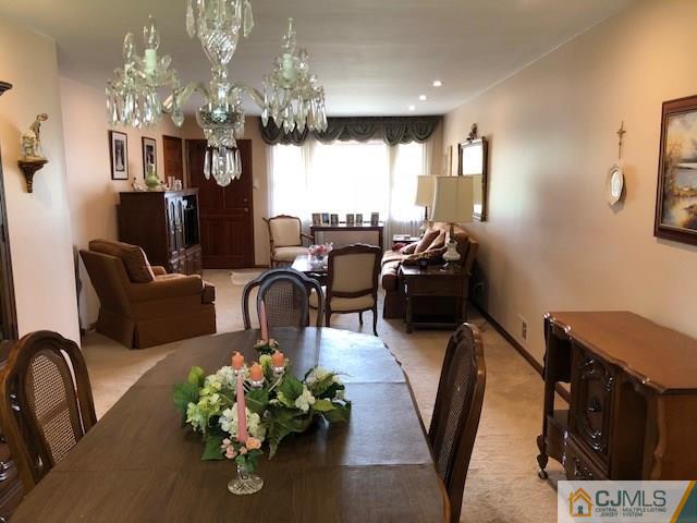 17 Brox Road Edison, NJ 08817 - Photo 5 of 11 a lobby with furniture and chandelier
