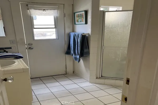 a view of walk in closet with window