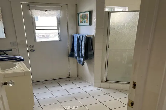 a view of walk in closet with window