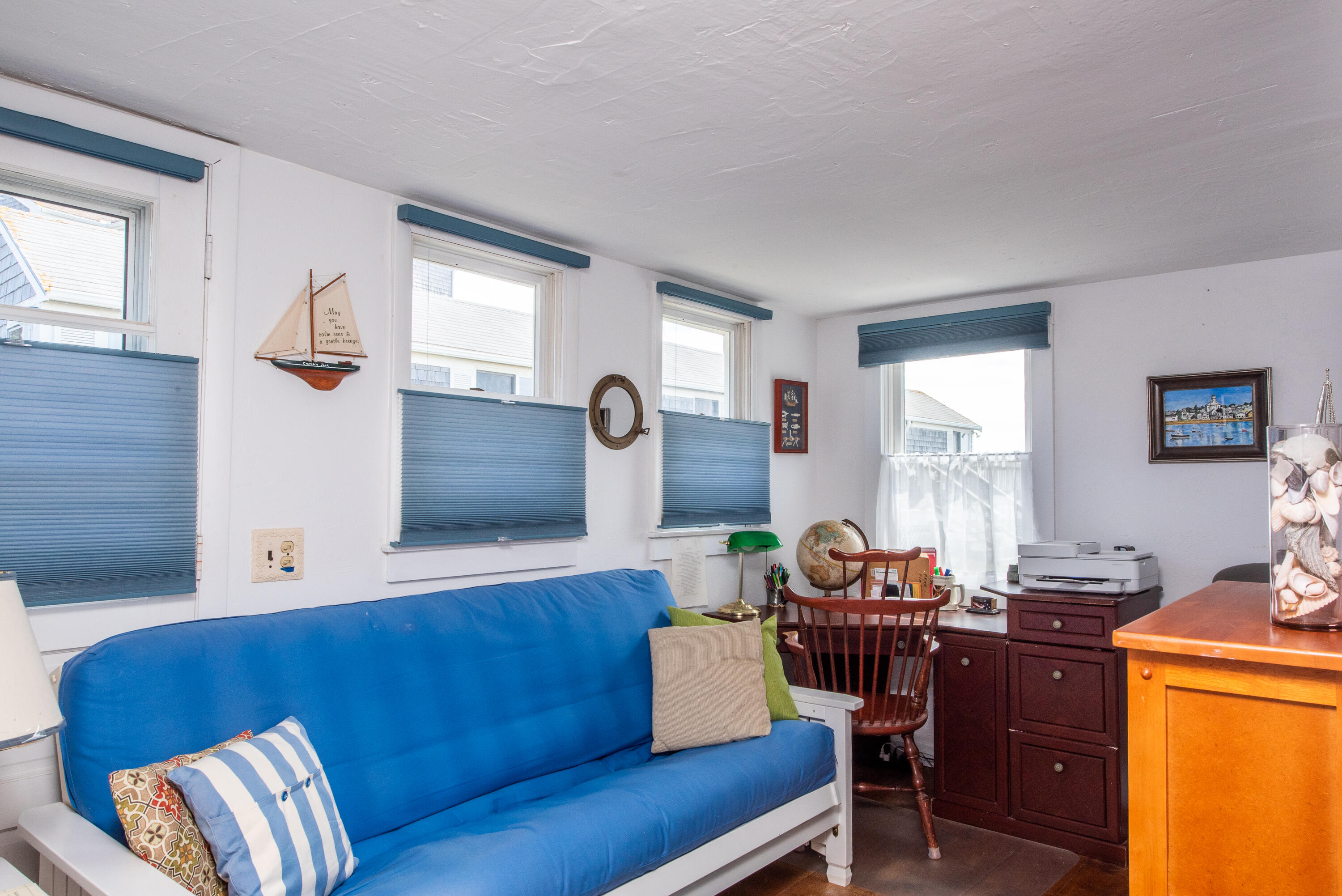 168 Shore Road, Unit 13 Truro, MA 02666 - Photo 13 of 28 a living room with furniture and a window