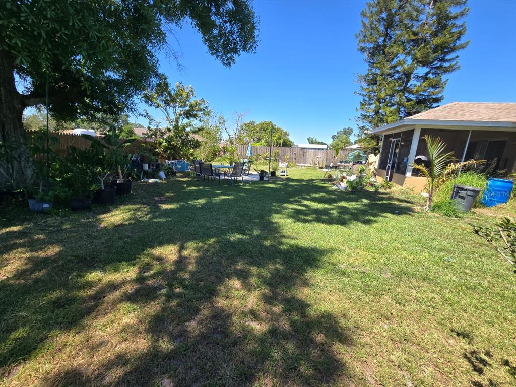 7818 Lewis Road Lakeland, FL 33810 - Photo 13 of 13 a view of a house with a big yard