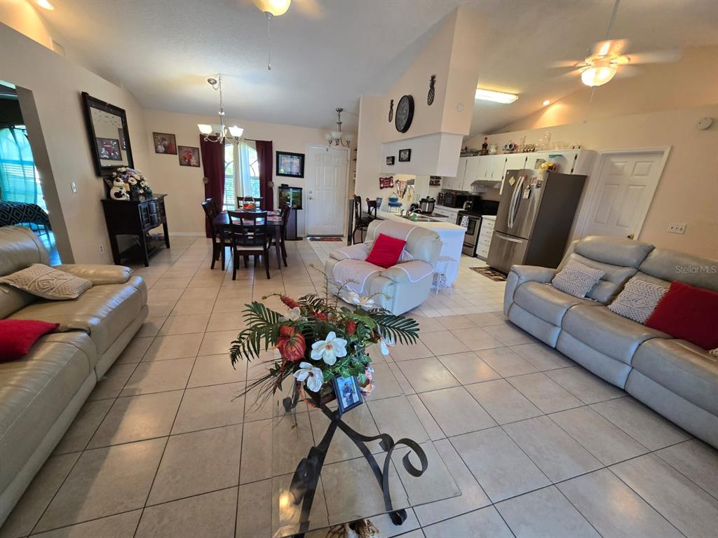 7818 Lewis Road Lakeland, FL 33810 - Photo 8 of 13 a living room with furniture and a potted plant