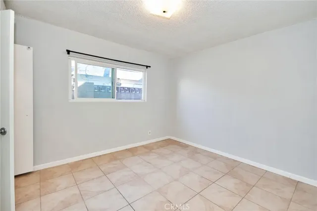 a bathroom with a shower and a toilet