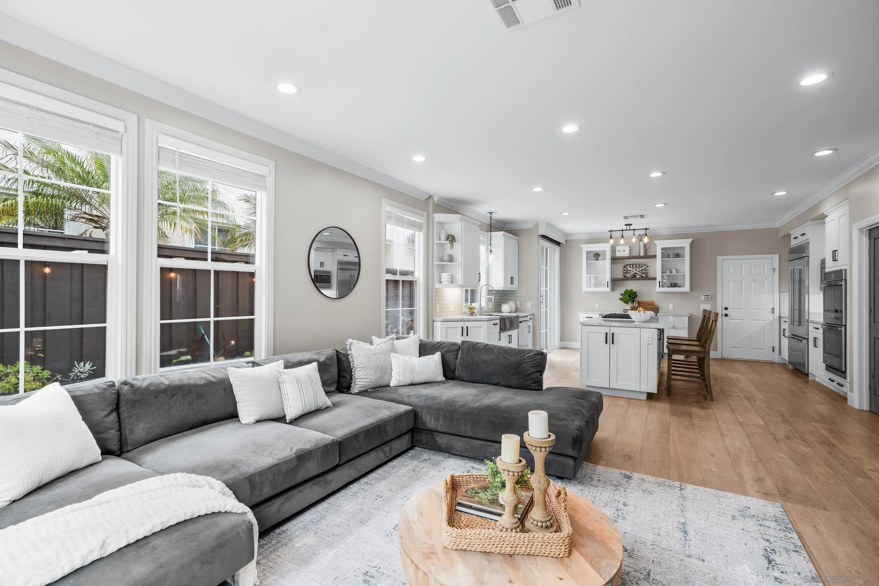 6402 Topmast Drive Carlsbad, CA 92011 - Photo 16 of 53 a living room with furniture fireplace and window