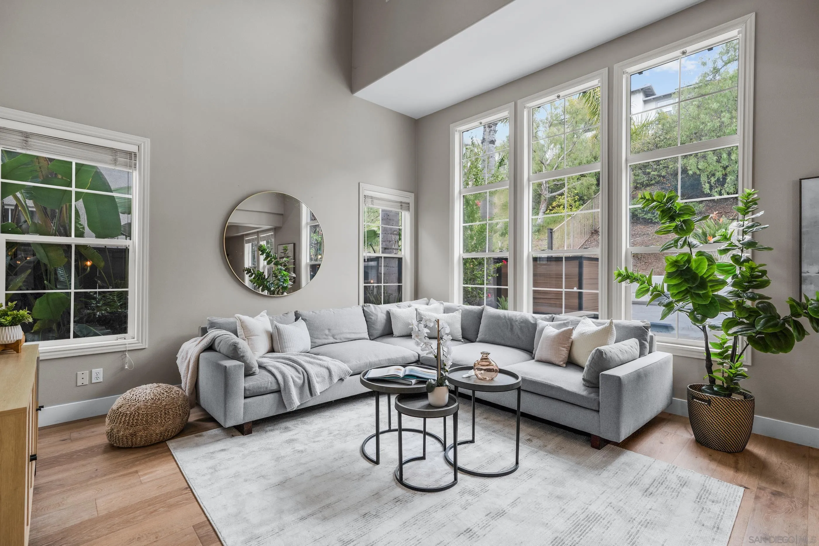 6402 Topmast Drive Carlsbad, CA 92011 - Photo 25 of 53 a living room with furniture and a potted plant