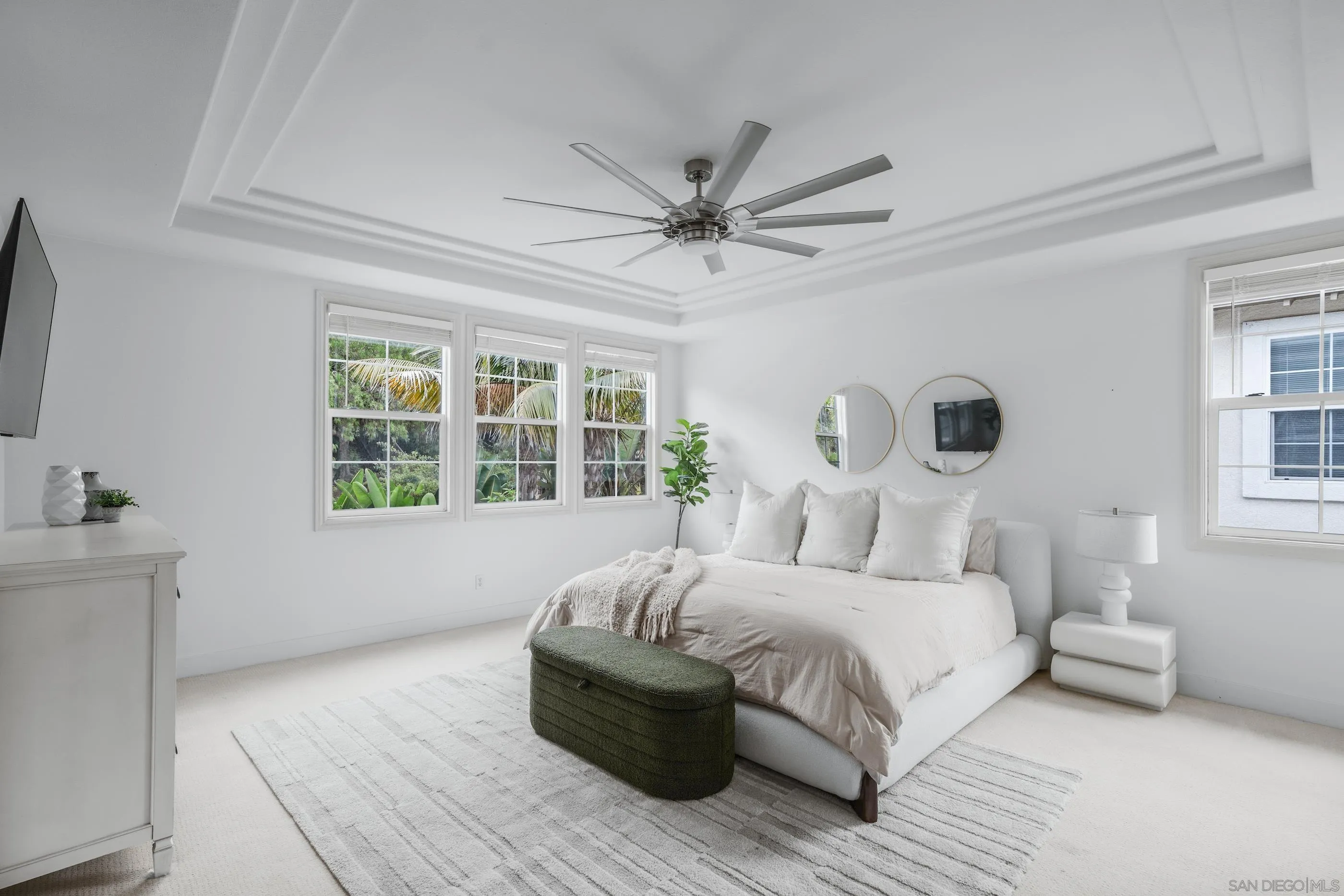 6402 Topmast Drive Carlsbad, CA 92011 - Photo 30 of 53 a bedroom with a large bed and a window