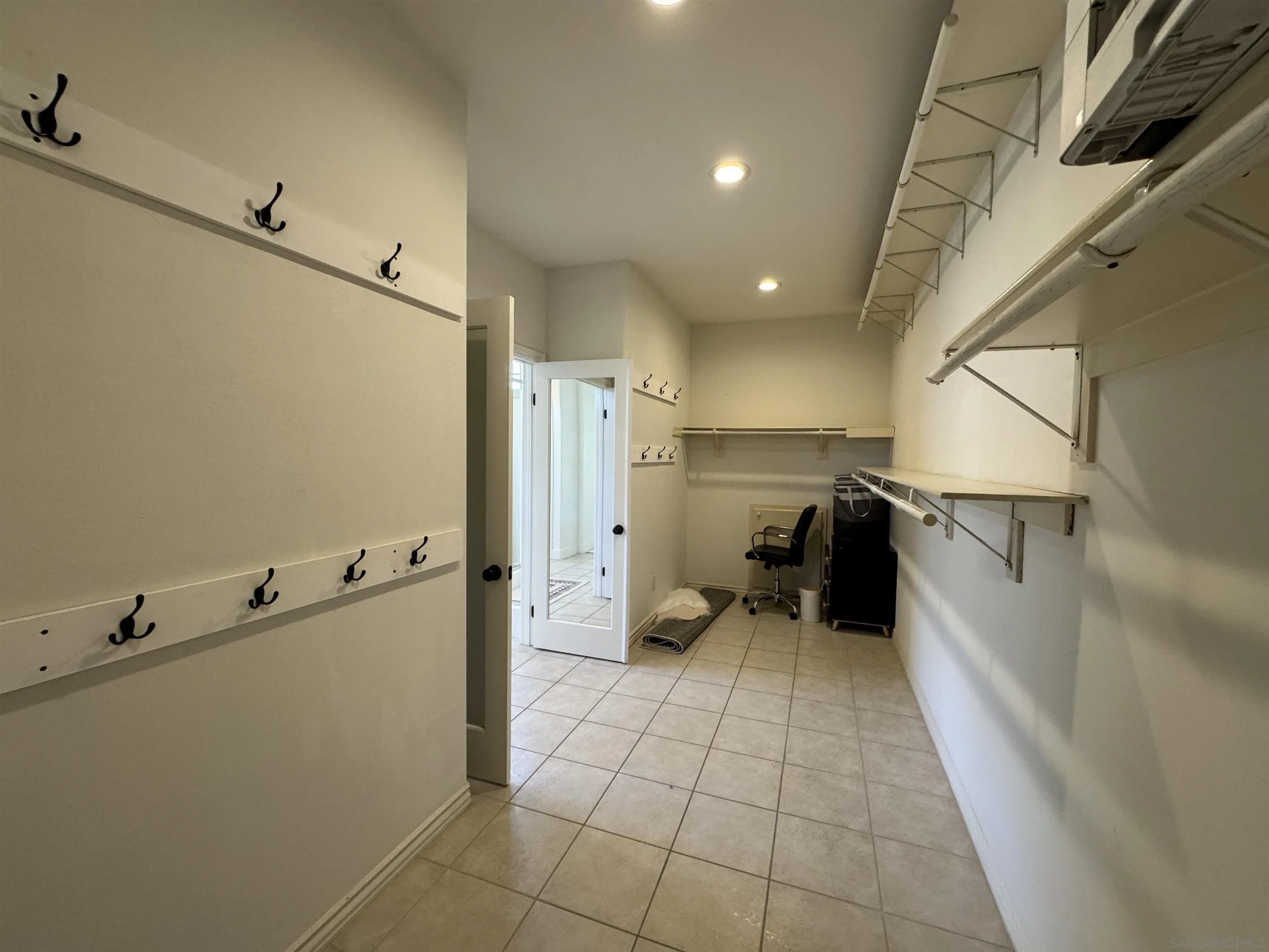 6402 Topmast Drive Carlsbad, CA 92011 - Photo 35 of 53 a kitchen with stainless steel appliances a refrigerator and a stove