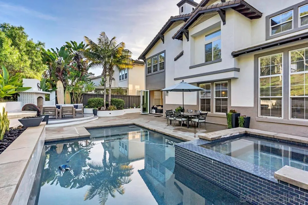 6402 Topmast Drive Carlsbad, CA 92011 - Photo 9 of 53 a view of a swimming pool with outdoor seating