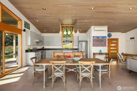 a view of a dining room with furniture