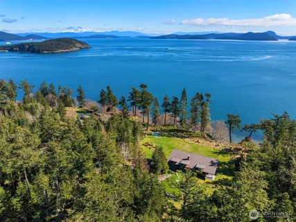 a view of a houses with a lake view