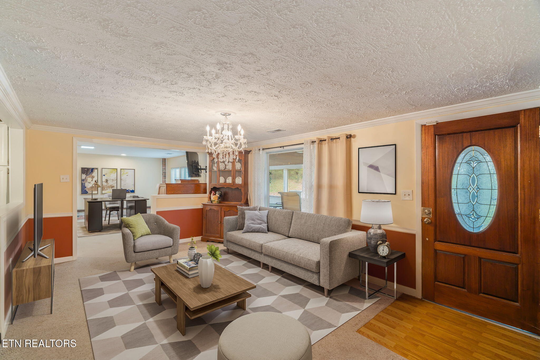 8404 Brickyard Road Powell, TN 37849 - Photo 14 of 49 a living room with furniture a rug a lamp and a window