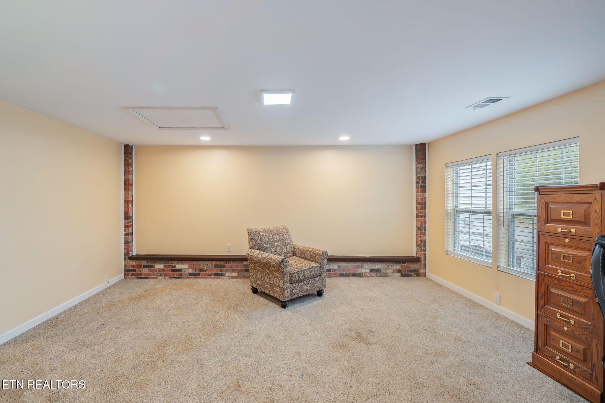 8404 Brickyard Road Powell, TN 37849 - Photo 18 of 49 a living room with furniture and a flat screen tv