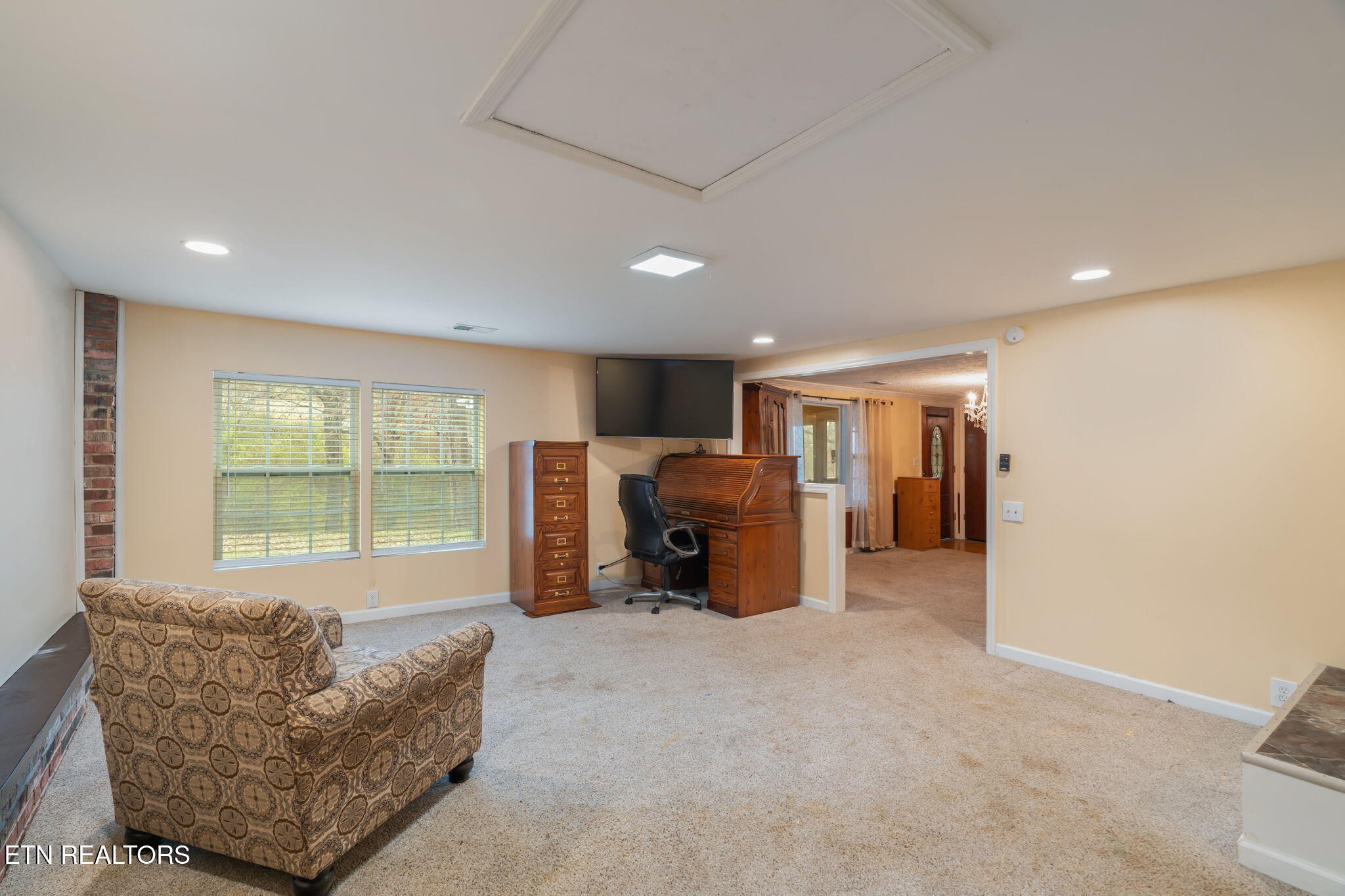 8404 Brickyard Road Powell, TN 37849 - Photo 20 of 49 a living room with furniture and a large window
